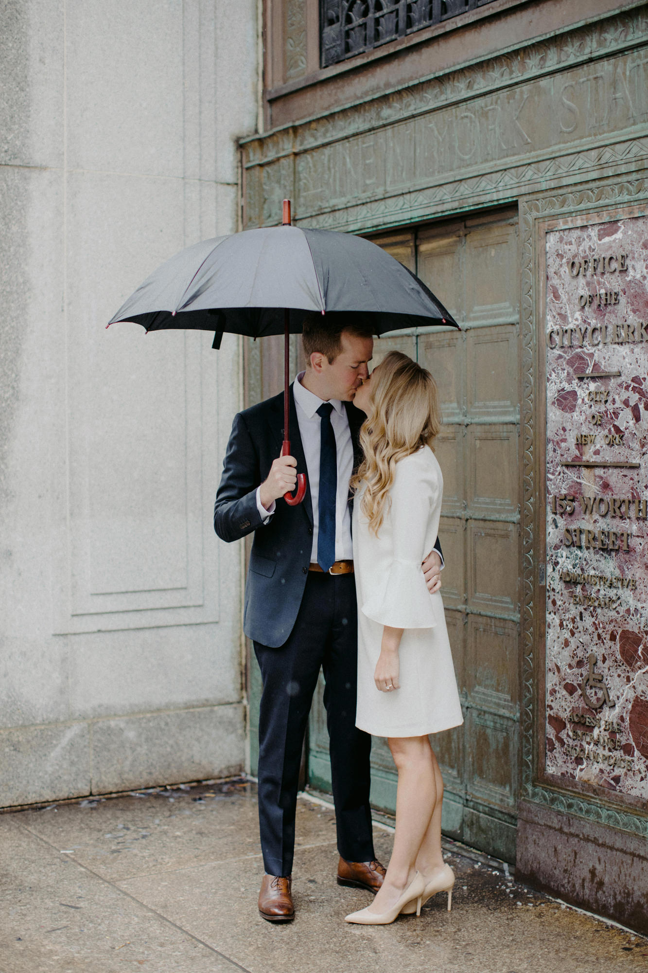rainy day wedding ceremony at City Hall