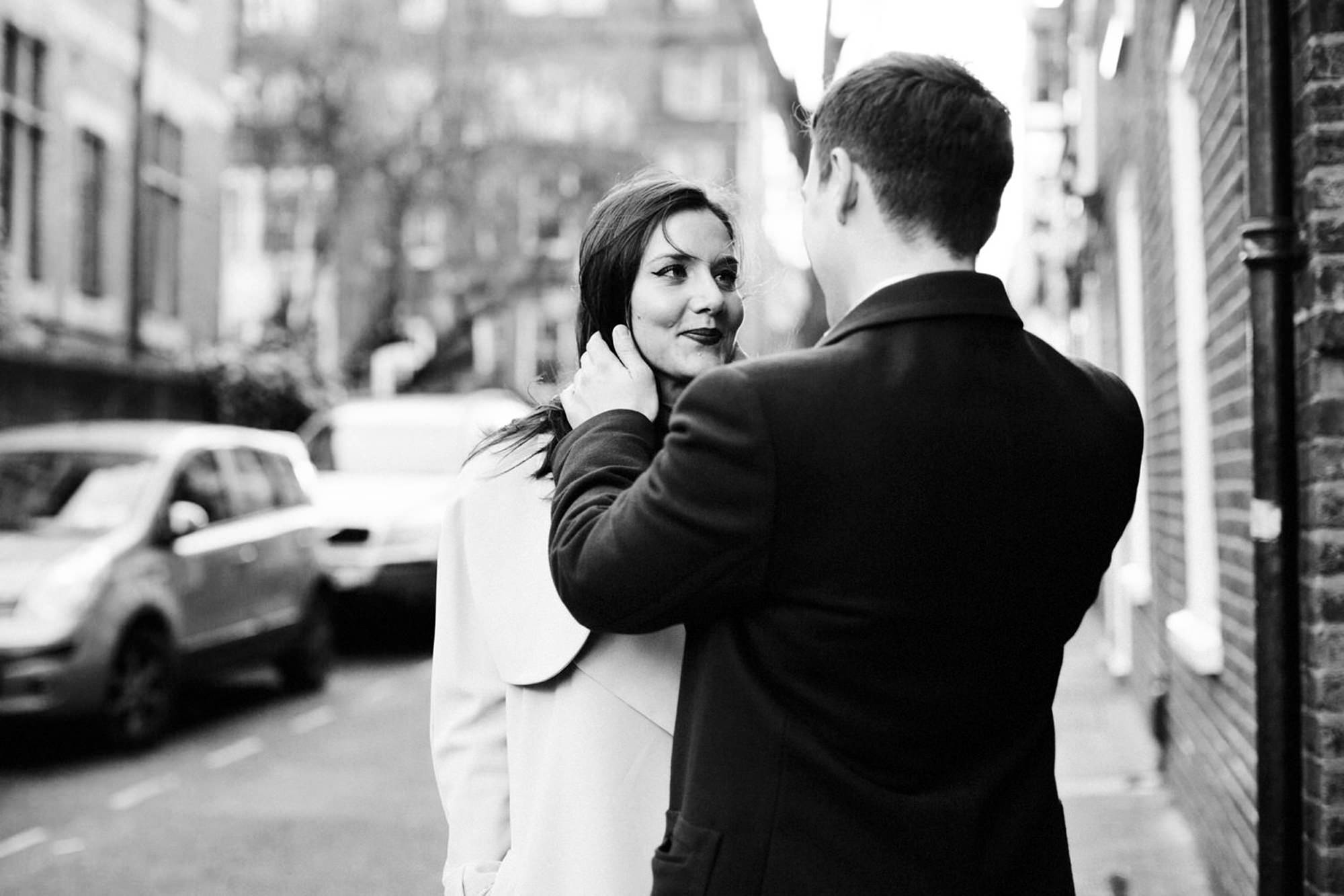 Couple looking at each at engagement shoot