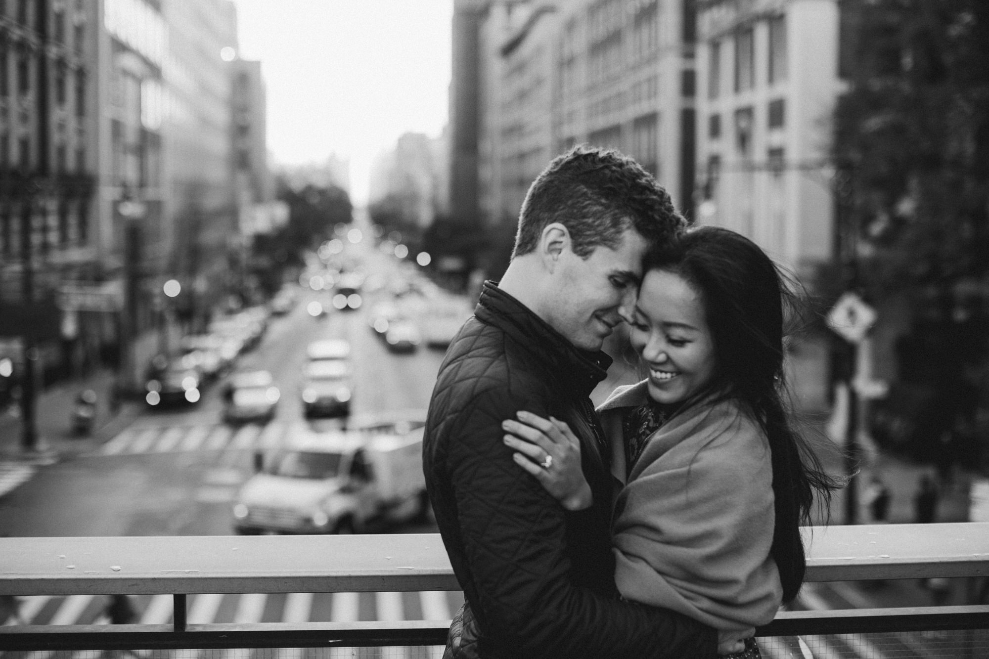 Couple in New York City on overpass