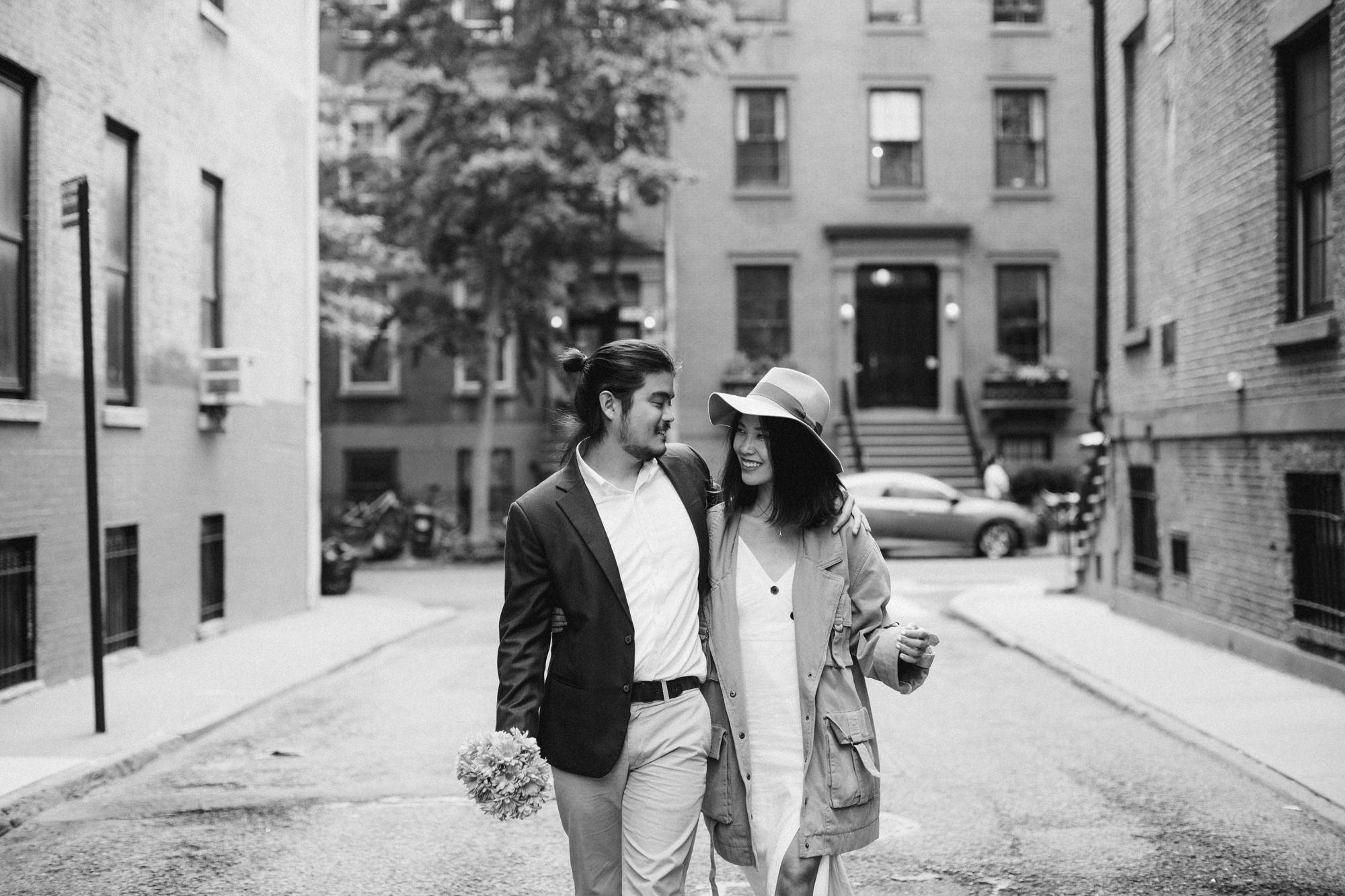 Couple walking through Brooklyn Heights