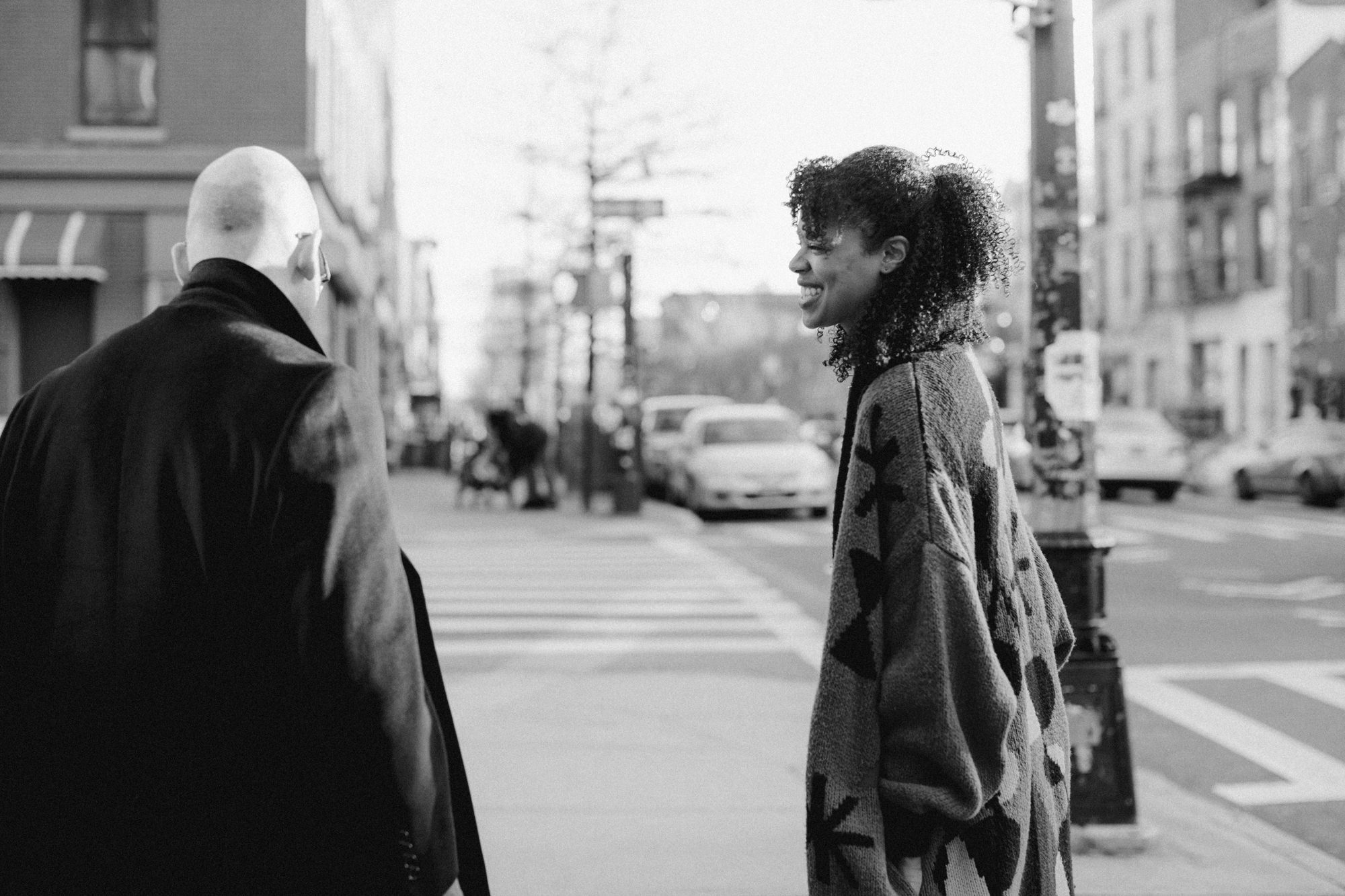 Couple walking on Greenpoint street