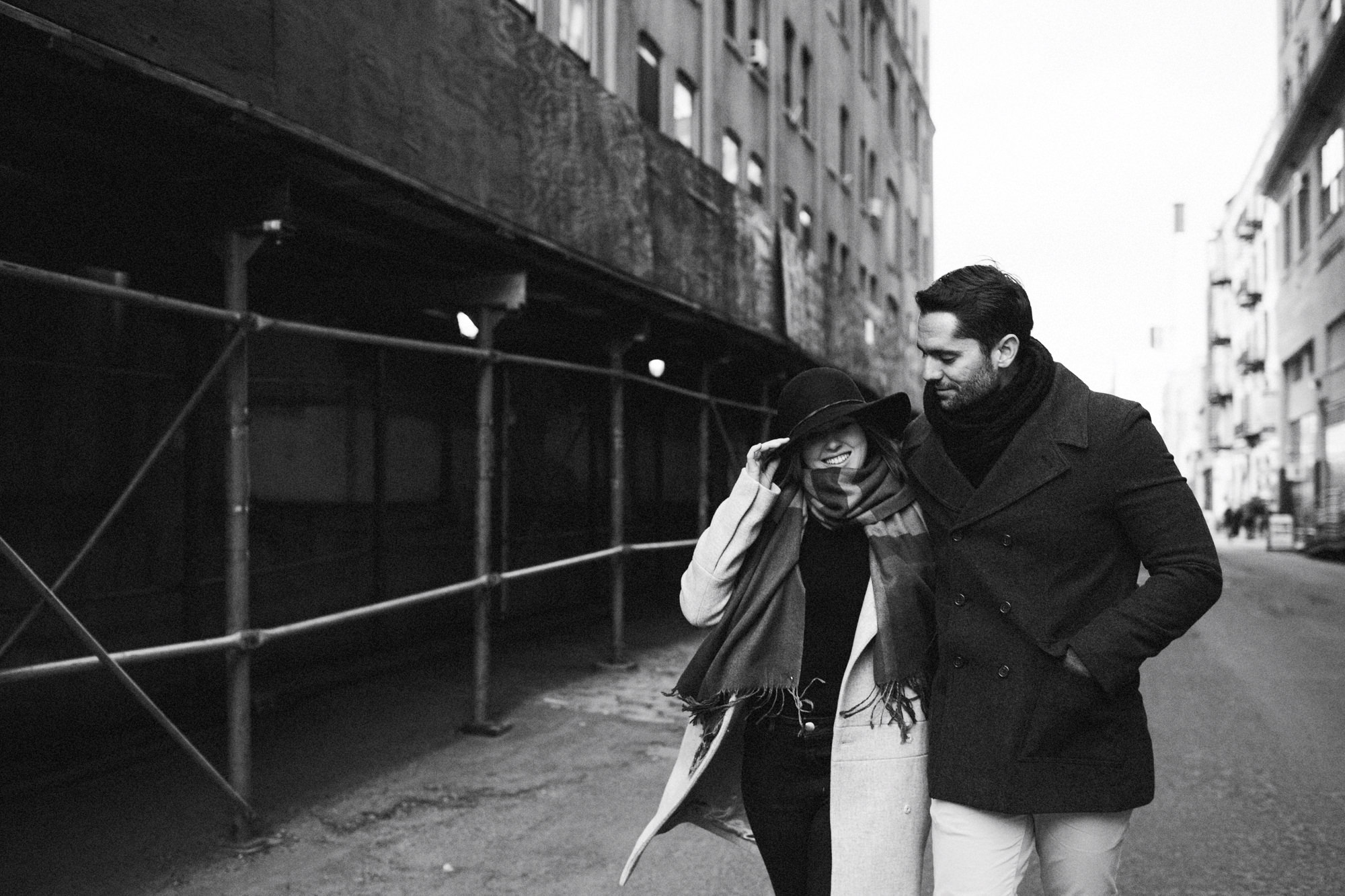Couple walking down street