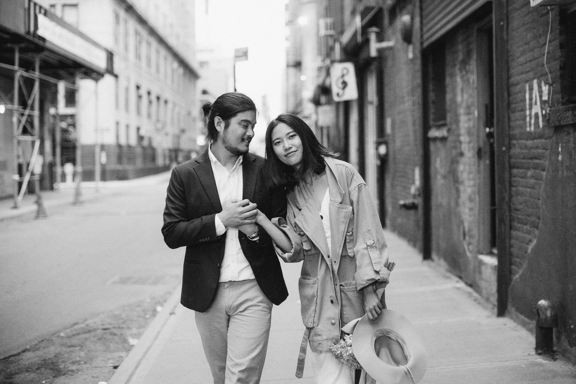 Couple walking down street