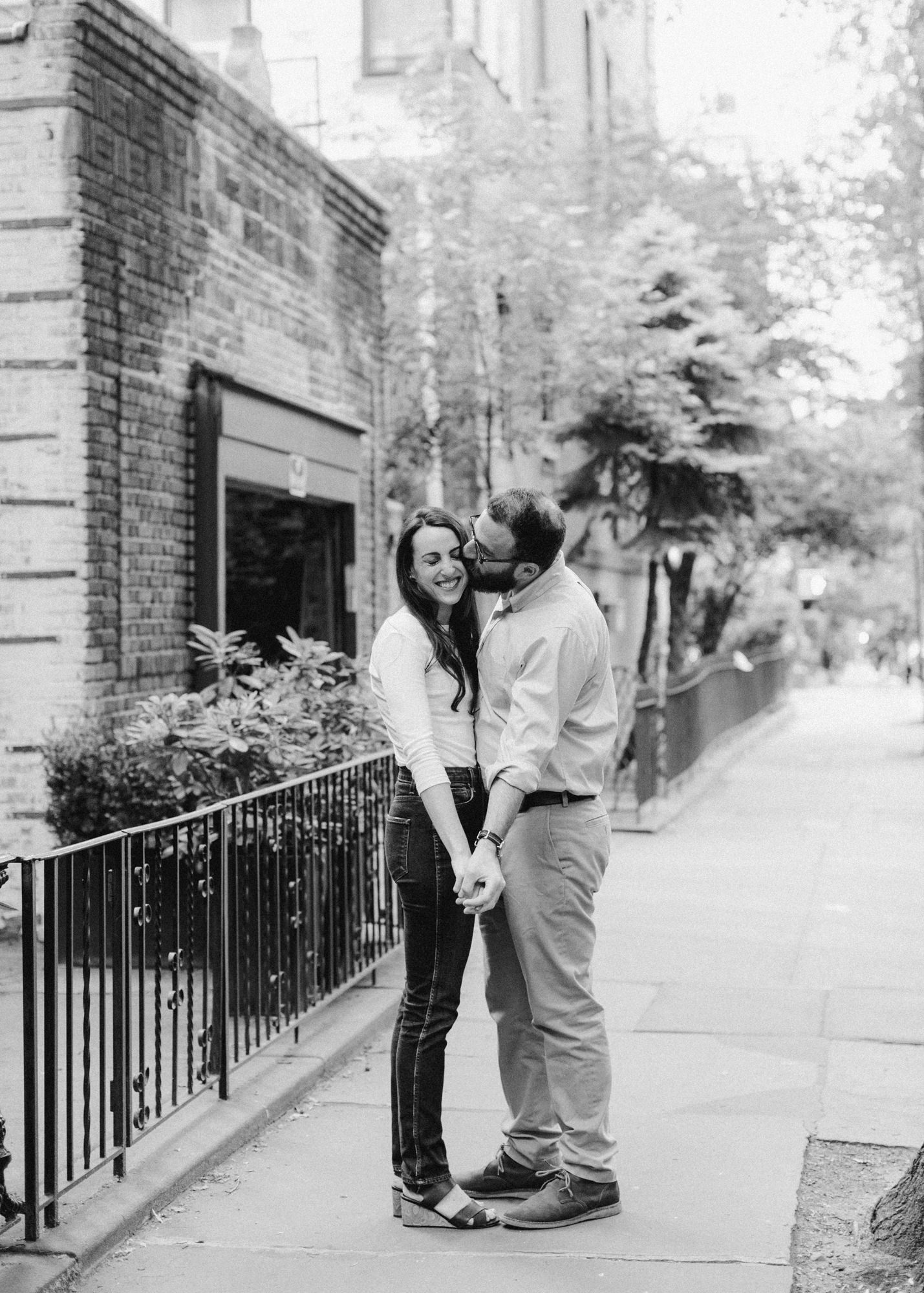 Couple kissing on street