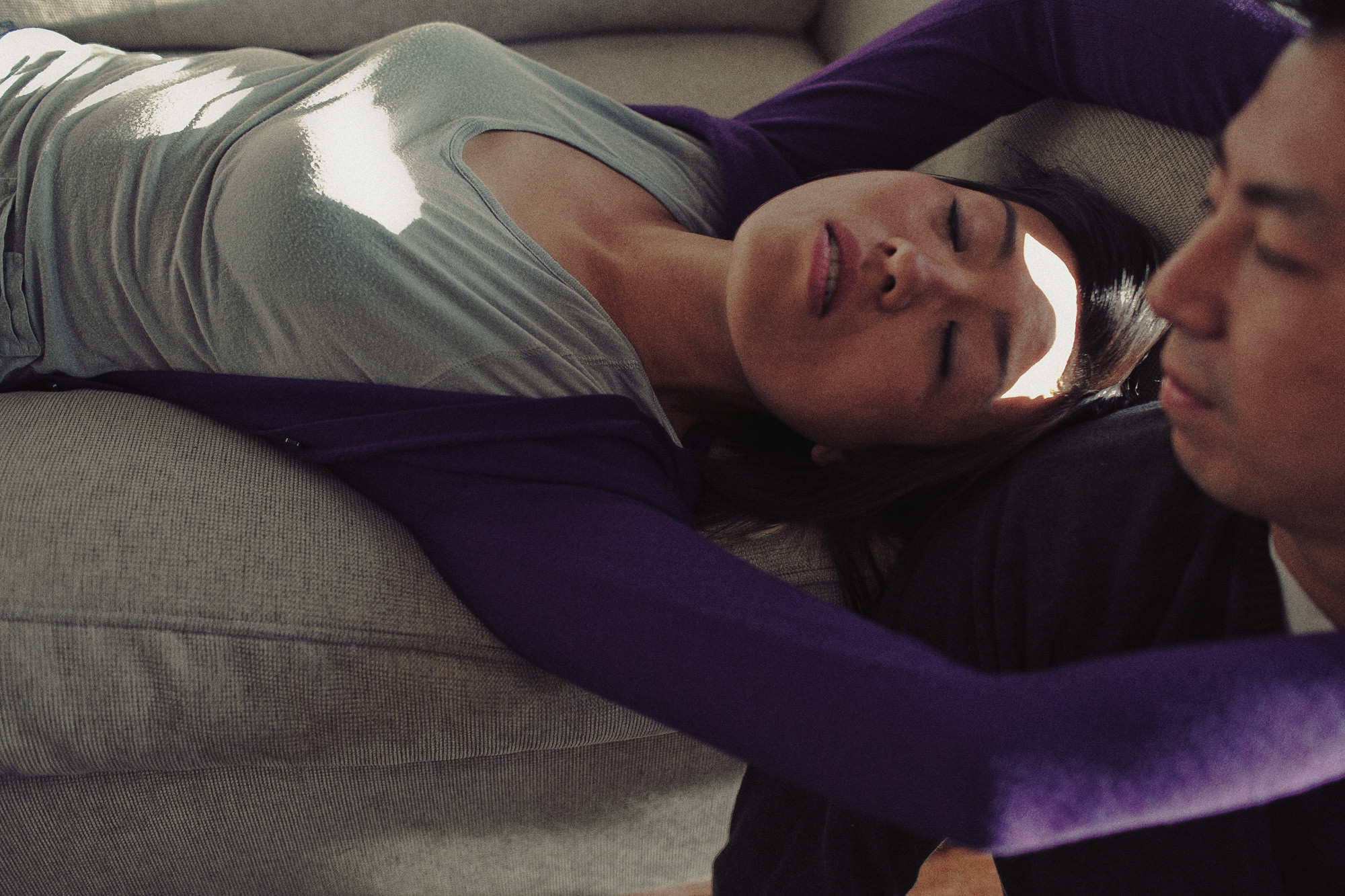 portrait of woman laying on couch