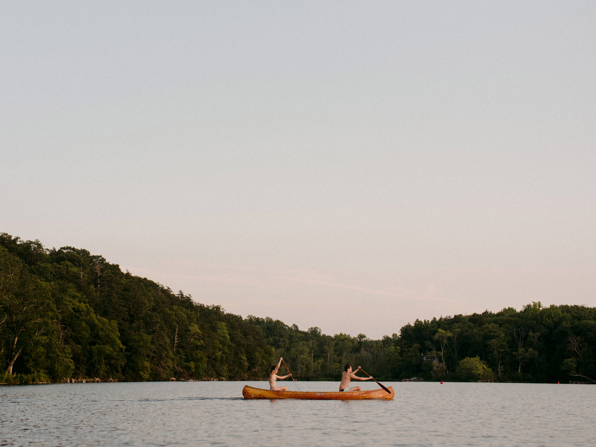 Couple kayaking adventure engagement shoot
